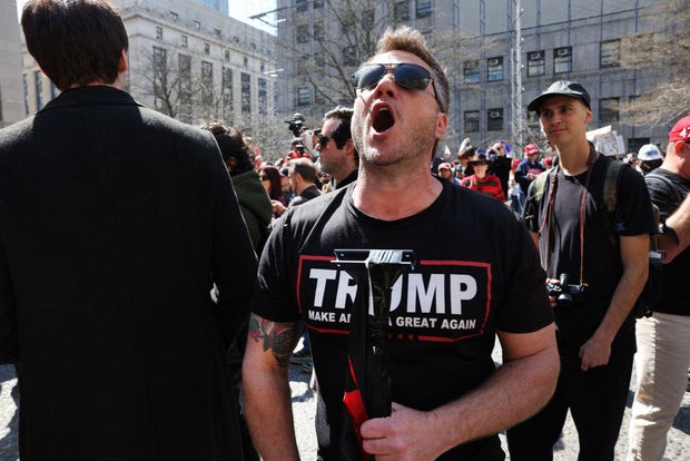 Supporters of former President Donald Trump gather outside of the Manhattan Criminal Court before his arraignment on April 4, 2023, in New York City. 