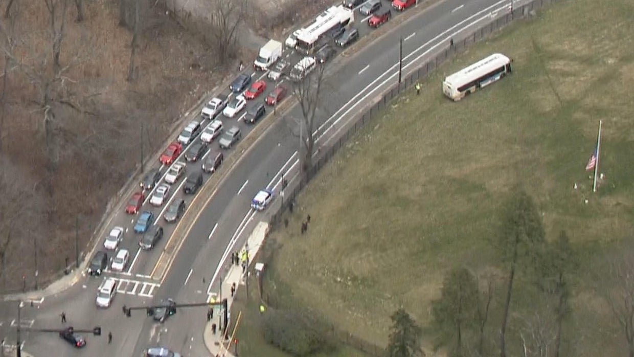 MBTA bus collides with car, crashes into cemetery - CBS Boston