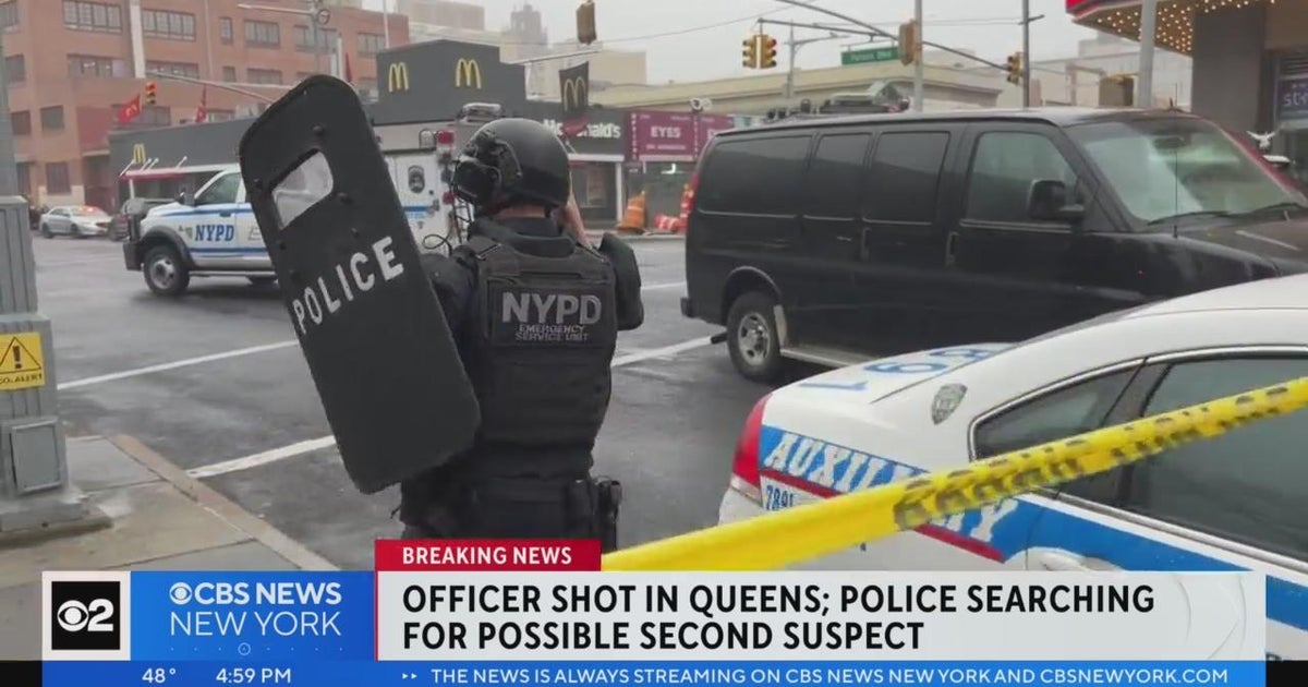 NYPD officer shot in the leg in Queens - CBS New York