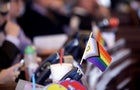 A flag supporting LGBTQ+ rights decorates a desk on the Democratic side of the Kansas House of Representatives during a debate on March 28, 2023, at the Statehouse in Topeka, Kansas. 