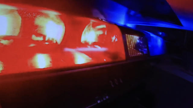 Emergency lights on a police car flashing 