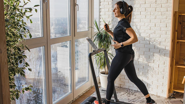 Woman jogging on treadmill 