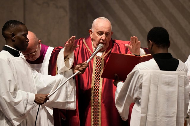 Pope Francis celebrates the Passion Mass on Good Friday, inside St. Peter's Basilica, at the Vatican, April 7, 2023. 