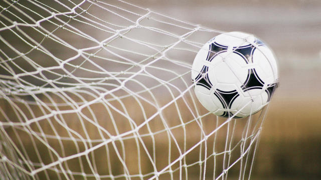 Football Trapped in a Goal Net, Close-Up 
