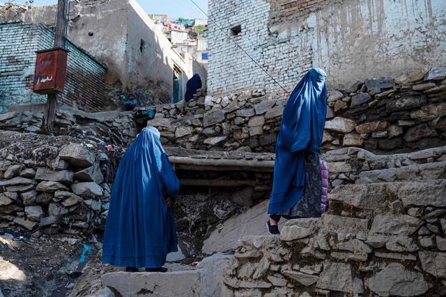 Taliban detains dozens of women in Afghanistan for breaking hijab rules  with modeling - CBS News