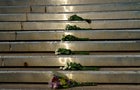Bouquets of flowers lay at the entrance of Old National Bank on April 11, 2023, for the victims of the mass shooting in Louisville, Kentucky, a day earlier. 
