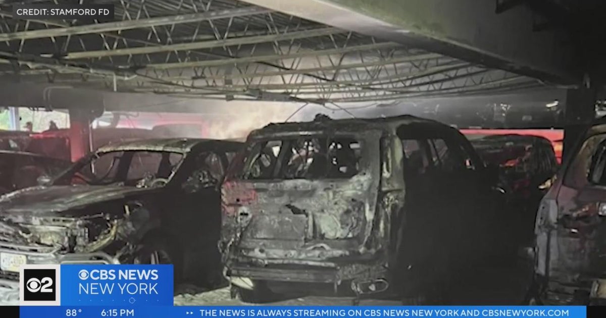 Over a dozen vehicles damaged in Stamford hotel parking garage fire