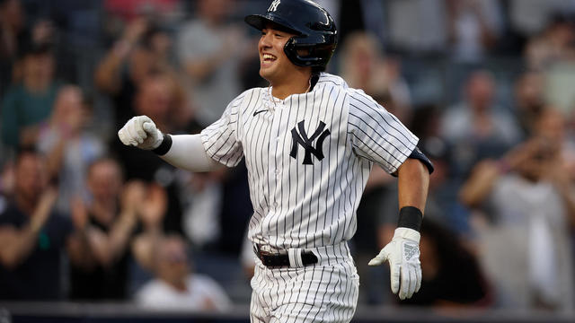 Anthony Volpe #11 of the New York Yankees celebrates his first Major League home run in the first inning against the Minnesota Twins at Yankee Stadium on April 14, 2023 in the Bronx borough of New York City. 