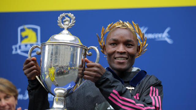 Kenya's Evans Chebet poses as he celebrates after winning the elite men's race in the Boston Marathon in Boston, Massachusetts, April 17, 2023. 