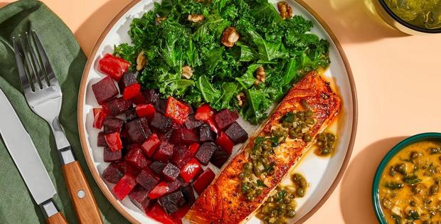 Salmon with Piccata Sauce roasted beets & bell pepper, sautéed kale with walnuts 