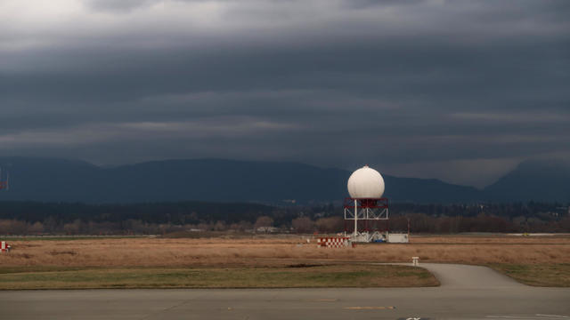 Doppler Weather Radar Station next to Airport Runway 