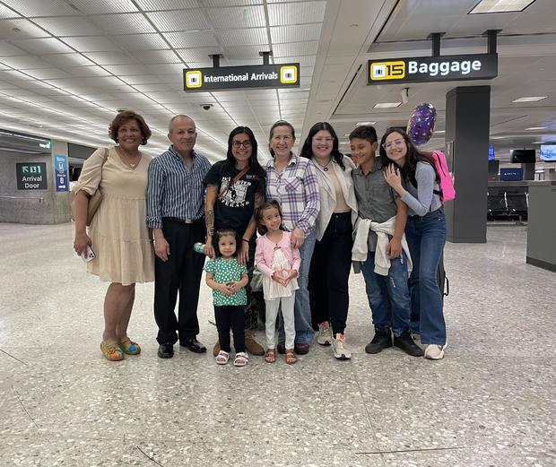 Returning to the U.S. gave Laura Meza a chance to reunite with her family and meet her granddaughter. 