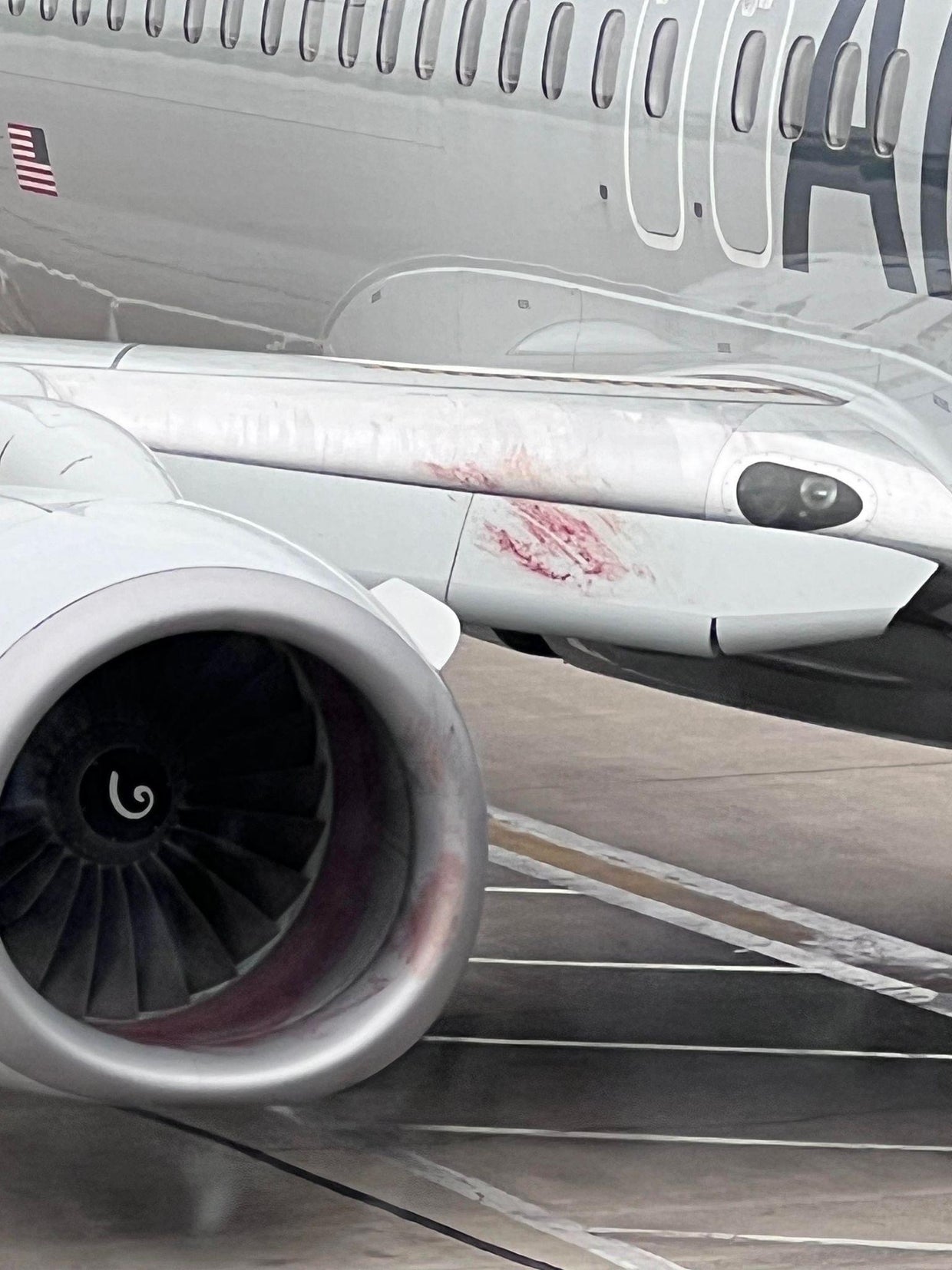 American Airlines plane engine catches fire, makes emergency landing in ...