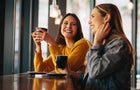Friends meeting in coffee shop on a weekend 