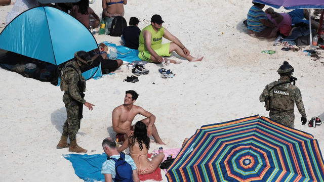 Mexican Marines patrol at Gaviota Azul beach during Holy Week in Cancun 