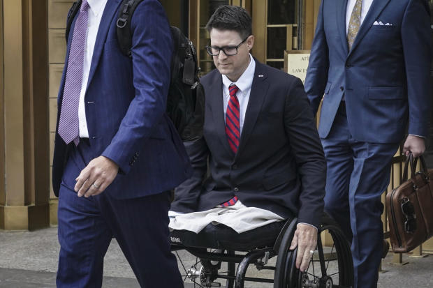 Brian Kolfage leaves court after being sentenced for defrauding donors to the "We Build the Wall" effort on Wednesday, April 26, 2023, in New York. 