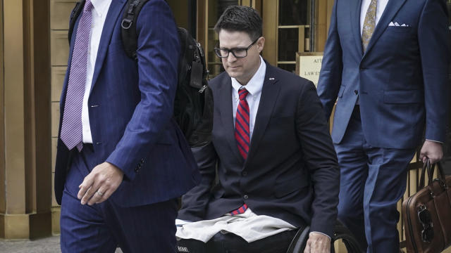 Brian Kolfage leaves court after being sentenced for defrauding donors to the "We Build the Wall" effort on Wednesday, April 26, 2023, in New York. 