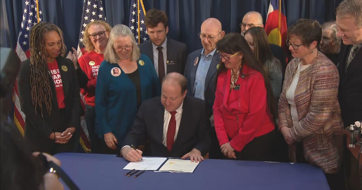 Gov. Jared Polis signs 4 gun control bills into law - CBS Colorado