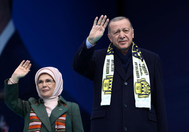 Turkish President Tayyip Erdogan, accompanied by his wife Emine Erdogan, greets his supporters during a rally ahead of the May 14 presidential and parliamentary elections, in Ankara, Turkey April 30, 2023. 
