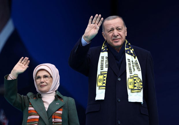 Turkish President Tayyip Erdogan, accompanied by his wife Emine Erdogan, greets his supporters during a rally ahead of the May 14 presidential and parliamentary elections, in Ankara, Turkey April 30, 2023.
