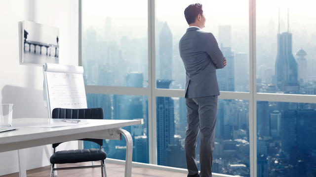 Businessman standing in office 