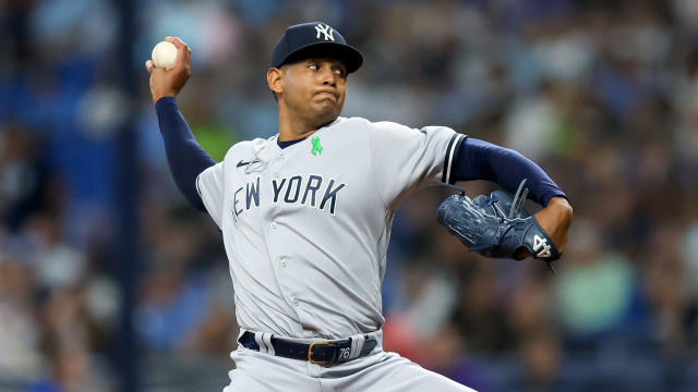 Jhony Brito #76 of the New York Yankees throws a pitch against the Tampa Bay Rays during the first inning of a baseball game at Tropicana Field on May 5, 2023 in St. Petersburg, Florida. 