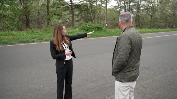 Det. Andrea Tozzi and Jim Axelrod