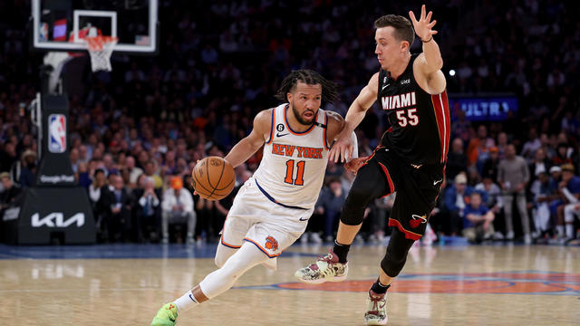 Jalen Brunson #11 of the New York Knicks drives to the basket against Duncan Robinson #55 of the Miami Heat during the fourth quarter in game five of the Eastern Conference Semifinals in the 2023 NBA Playoffs at Madison Square Garden on May 10, 2023 in Ne 