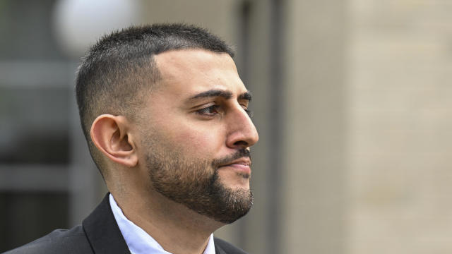 Nauman Hussain, who ran the limousine company involved in the 2018 crash that killed 20 people, walks outside during a lunch break in a new trial in Schoharie, N.Y., on May 1, 2023. 