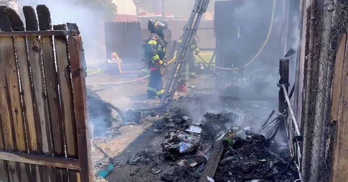 RAW: Firefighters battle blaze at boarded-up north Sacramento home