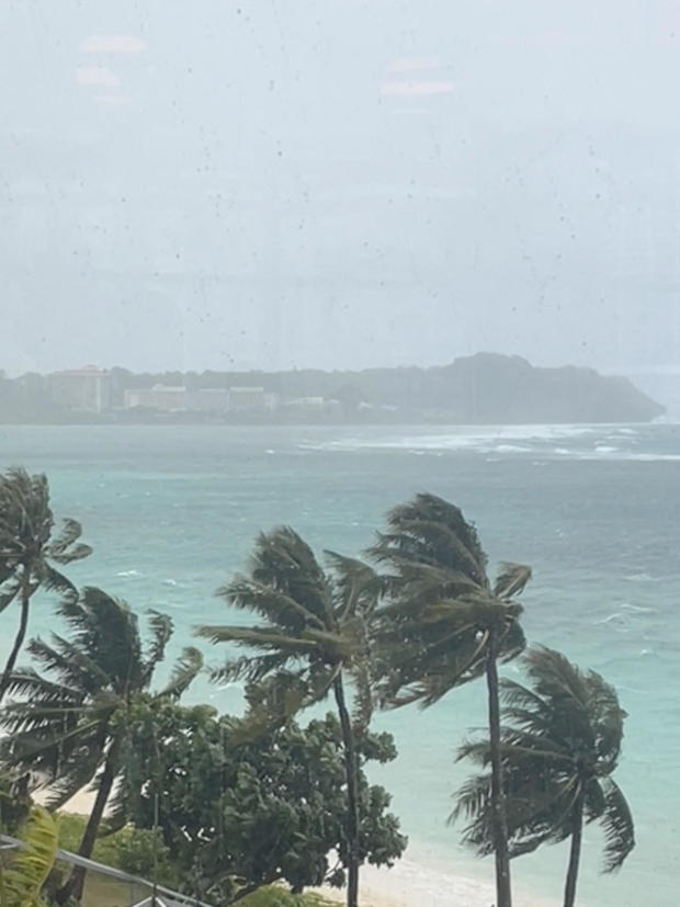 Trees sway in strong winds from typhoon Mawar in Tamuning 