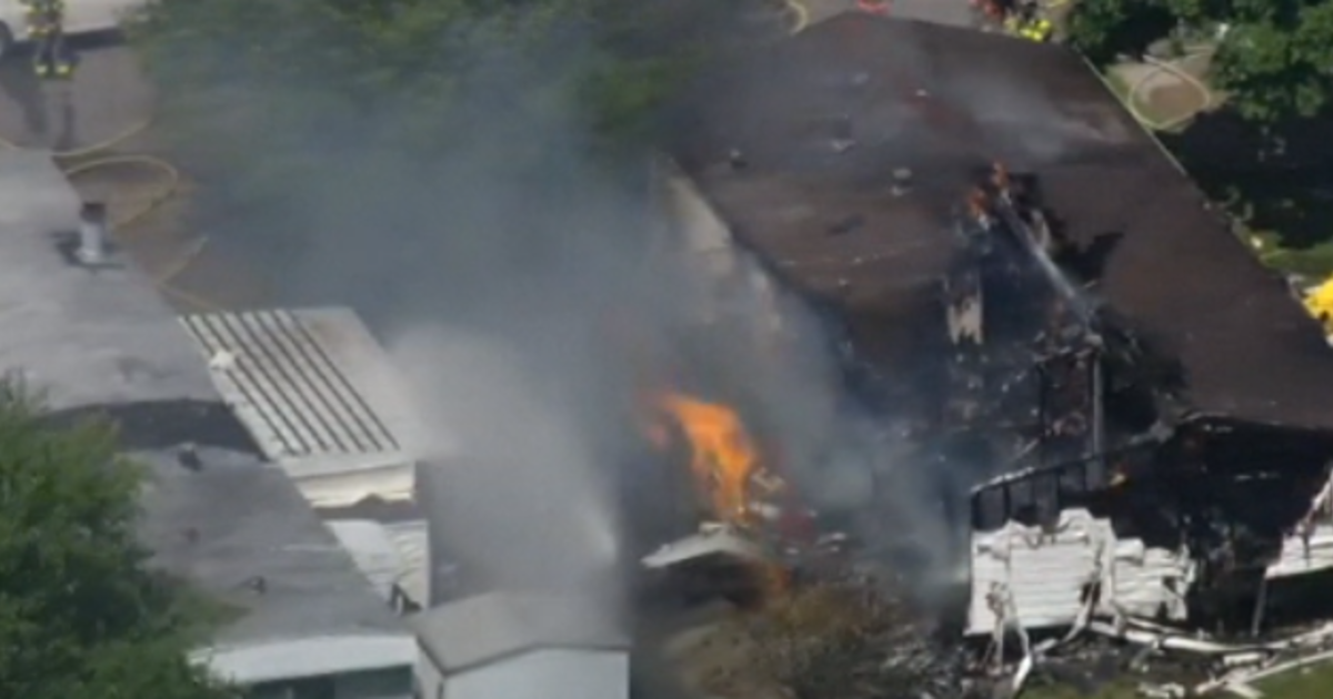 Crews at the scene of a mobile home explosion in Chesterfield Township