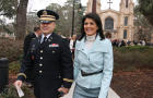 Governor Nikki Haley, joined by her family Michael, Rena and  Nalin, cross Sumter Street on their way to the State House after the Inaugural Prayer service held at Trinity Episcopal Cathedral, Wednesday morning. 