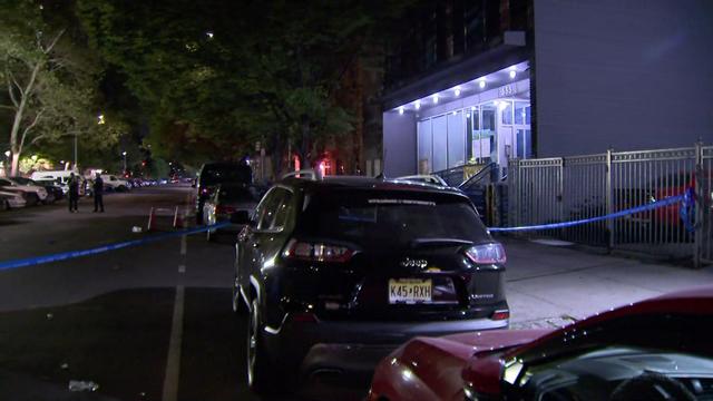 Crime scene tape blocks off a street in East Harlem. 