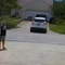 Man arrested for aiming gun at woman's head after friend used his driveway