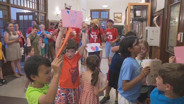 Somerville students outside mayor's office 