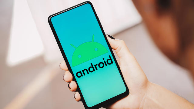 In this photo illustration, the Android logo is displayed on 