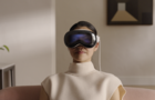 Excited man wearing VR glasses 