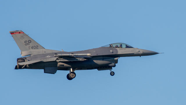 An F-16 Fighting Falcon fighter aircraft extended its landing gear to land at the U.S. military airfield at Spangdahlem on Feb. 7, 2023. 