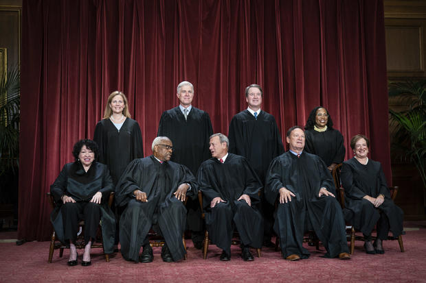 Members of the Supreme Court sit for a group photo on Friday, Oct. 7, 2022. 