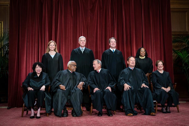 Members of the Supreme Court sit for a group photo on Friday, Oct. 7, 2022, in Washington, D.C.