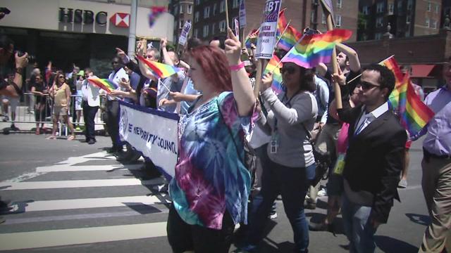 New York City Council members walk in the Queens Pride Parade. 