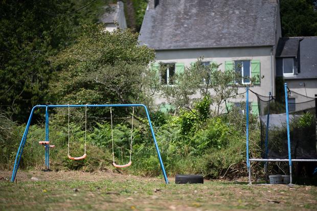 This photograph taken on June 12, 2023 shows the garden and swing where a 11-year old girl was killed, in Plonevez-du-Faou, western France. 