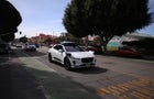 Self-driving Waymo cars on the road in Santa Monica 