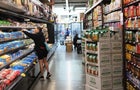 Woman in a supermarket aisle 