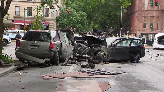 Multiple vehicles wrecked in an intersection. 