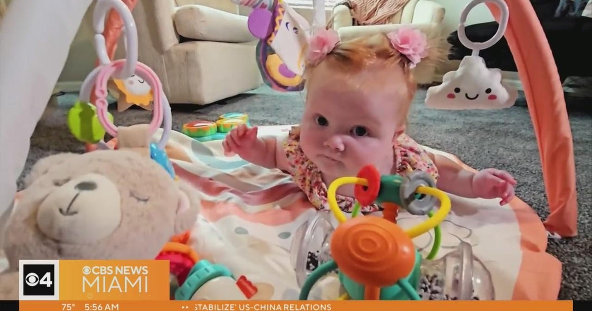 Florida firefighter adopts baby left in 