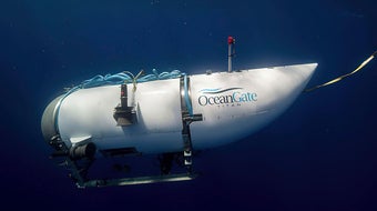 Deep-sea robot reaches sea floor in hunt for missing Titanic sub 