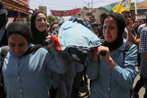 TOPSHOT-PALESTINIAN-ISRAEL-CONFLICT-FUNERAL