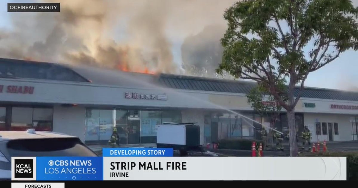 Three-alarm fire engulfs strip mall in Irvine - CBS Los Angeles